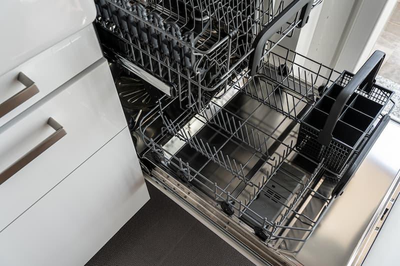 An unstacked dishwasher.