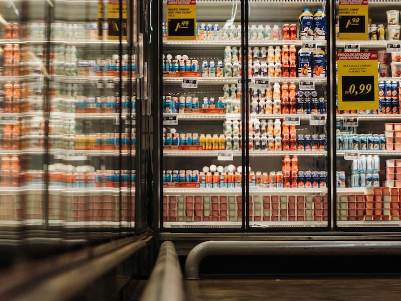 A commercial fridge, fully stocked up.